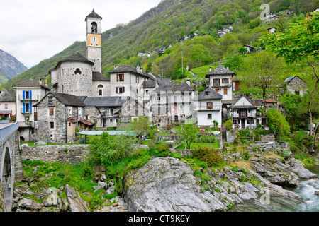 Lavertezzo,Helicopter Delivering Material to Hillside House above Village,Val Verzasca,Verzasca River,Ticino,Switzerland Stock Photo