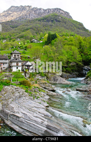 Lavertezzo,Helicopter Delivering Material to Hillside House above Village,Val Verzasca,Verzasca River,Ticino,Switzerland Stock Photo