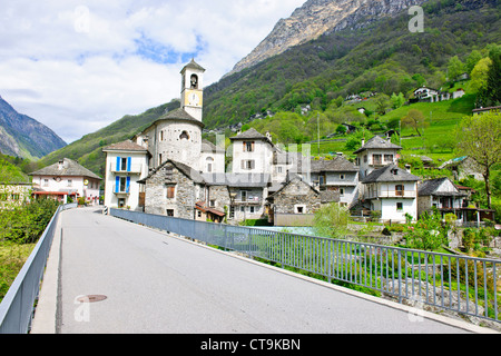 Lavertezzo,Helicopter Delivering Material to Hillside House above Village,Val Verzasca,Verzasca River,Ticino,Switzerland Stock Photo