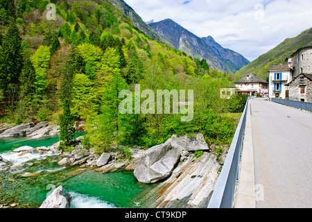 Lavertezzo,Helicopter Delivering Material to Hillside House above Village,Val Verzasca,Verzasca River,Ticino,Switzerland Stock Photo