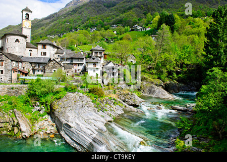 Lavertezzo,Helicopter Delivering Material to Hillside House above Village,Val Verzasca,Verzasca River,Ticino,Switzerland Stock Photo