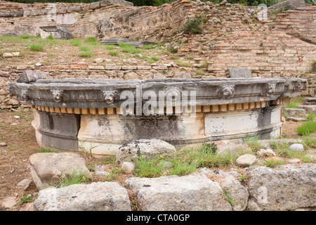 A carved stone exhibit in the Nymphaion also known as Nymphaeum of Herodes Atticus, Olympia, Greece Stock Photo