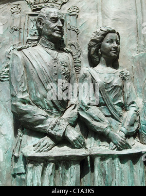 Relief of King Juan Carlos of Spain and his wife, Queen Sofia, on cathedral door in Madrid, Spain Stock Photo