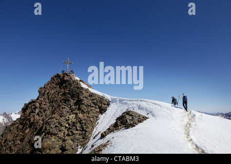 Two mountaineers at the summit, Otztaler Alps, Tyrol, Austria Stock Photo