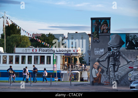 Banks of the river Spree and Berlin Wall mural, East Side Gallery, Berlin, Germany, Europe Stock Photo