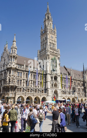 Crowds of people in Marienplatz in front of New City Hall, Munich, Bavaria, Germany Stock Photo