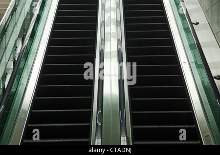 detail of modern glass and metal escalator Stock Photo