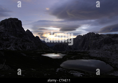 Mountain lakes, Sexten Dolomites at sunrise, Dolomites, South Tyrol, Trentino-Alto Adige, Italy Stock Photo