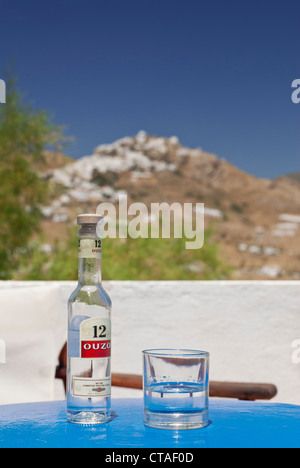 Bottle of Ouzo and glass, Serifos Island, Cyclades, Greece Stock Photo