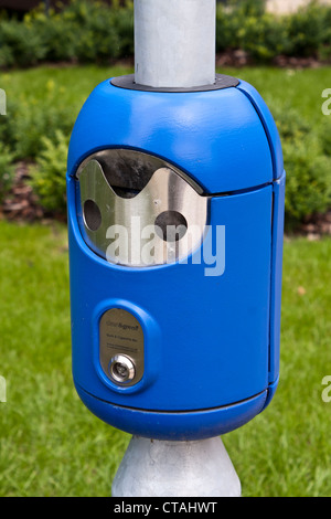 Bin for office workers to dispose of used cigarette stubs and chewing gum. Stock Photo