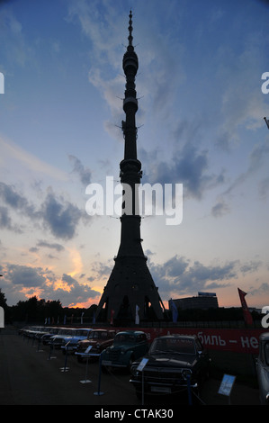 Ostankino Tower, television and radio tower in Moscow. Shown at night during a Lada Historical car exhibit. Stock Photo