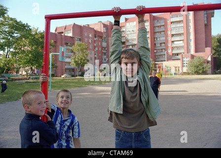 Playing boy in a village, Kaliningrad, Russia Stock Photo