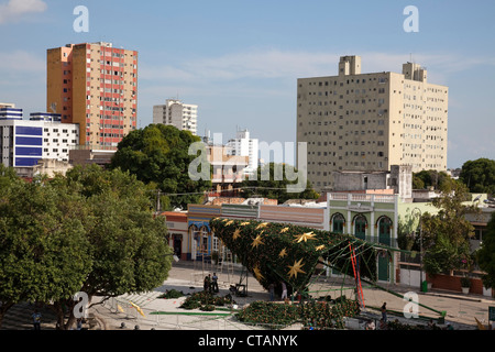 Workers set up Christmas tree and decorations on plaza opposite Theatro Amazonas Manaus opera house, Manaus, Amazonas, Brazil, S Stock Photo