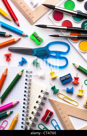 Assortment of various school items, white background Stock Photo