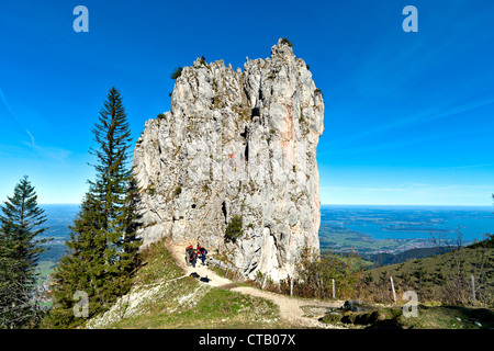 Mountaineers at Staffelstein, Kampenwand, lake Chiemsee in background, Chiemgau, Upper Bavaria, Germany Stock Photo