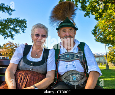 Couple wearing traditional clohtes, Prien, lake Chiemsee, Chiemgau, Upper Bavaria, Germany Stock Photo