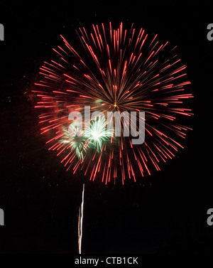 Fireworks in a dark sky separated from city and ready to isolate for use in other images Stock Photo