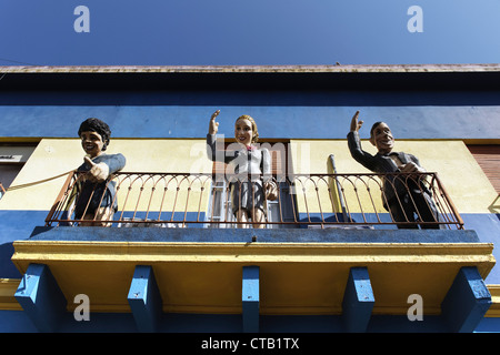 Carlos Gardel, Diego Maradonna, Evita Peron on balcony in La Boca, Buenos Aires, Argentina Stock Photo