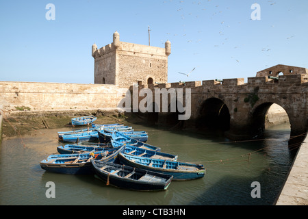 Essaouira Morocco - Fishing boats in the harbour with ramparts, Essaouira, Morocco Africa Stock Photo