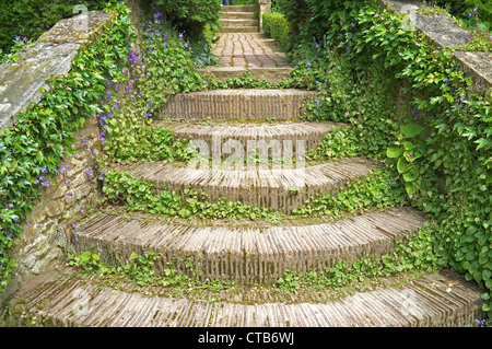 Steps made from roof tiles in a Cotswold garden , England, UK Stock Photo