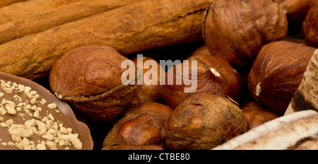 coffee beans, cinnamon and nuts Stock Photo