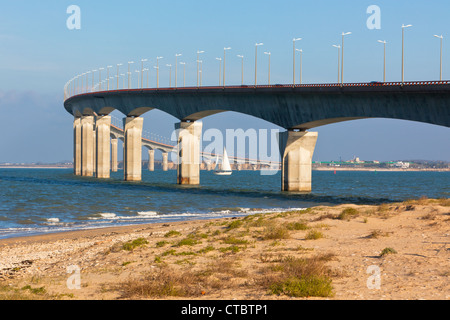 Curved Concrete Bridge over the water. Horizontal shot Stock Photo