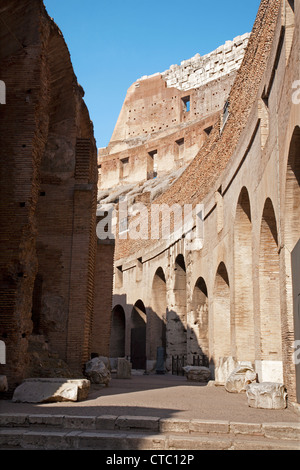 ROME - MARCH 23: North part of Colosseum interior in morning light on March 23, 2012 in Rome. Stock Photo
