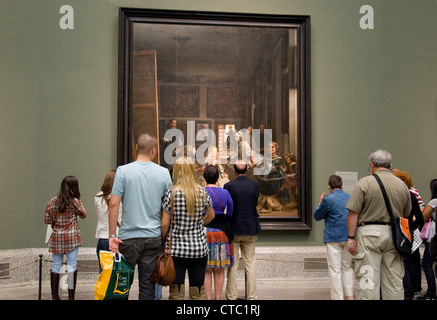 Admirers view Las Meninas from 1656 by Spanish painter Diego Velázquez at Museo del Prado in Madrid Stock Photo