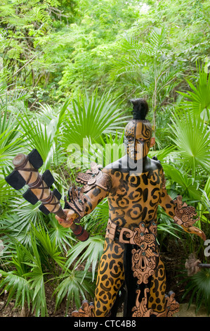 A Maya sacred animal actor/dancer in Dios Jaguar dress (costume) at the Riviera Maya's Xcaret Park in Mexico. Stock Photo