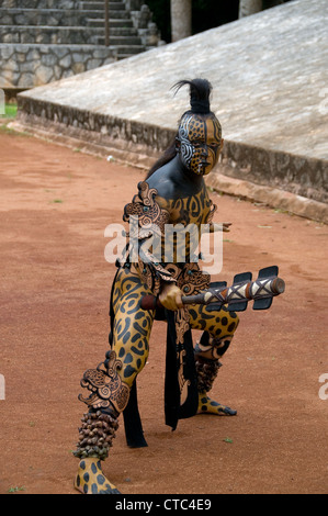 A Maya sacred animal actor/dancer in Dios Jaguar dress (costume) at the Riviera Maya's Xcaret Park in Mexico. Stock Photo