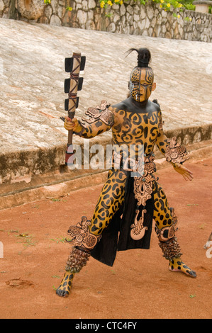 A Maya sacred animal actor/dancer in Dios Jaguar dress (costume) at the Riviera Maya's Xcaret Park in Mexico. Stock Photo