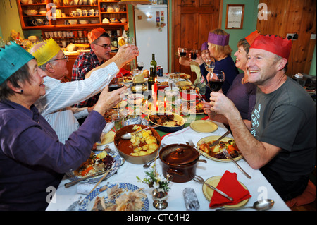 Family With Grandparents Enjoying Christmas Meal At Table Stock Photo Alamy