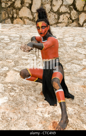 A Maya actor/dancer in Rattle Snake (Serpiente Casecabel) dress (costume) at the Riviera Maya's Xcaret Park in Mexico. Stock Photo