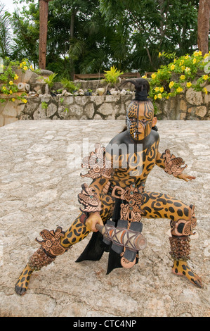 A Maya sacred animal actor/dancer in Dios Jaguar dress (costume) at the Riviera Maya's Xcaret Park in Mexico. Stock Photo