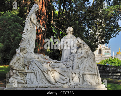 Statue at entrance of Sanctuary of Our Lady of Lourdes, Pyrenees, France Stock Photo