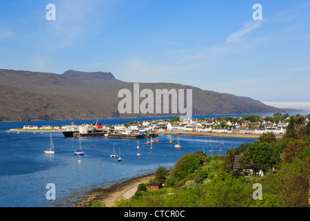 View to fishing port on Loch Broom with ferry in dock on north west coast Ullapool Wester Ross Ross and Cromarty Scotland UK Stock Photo