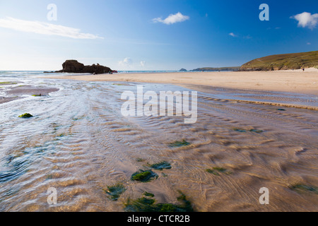 The river that flows down Perranporth Beach Cornwall England UK Stock Photo