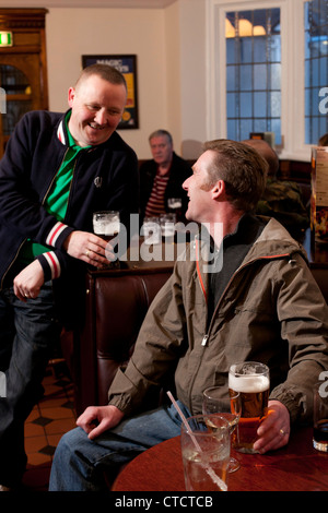 People enjoying themselves in the Old Clarence Pub, Earlsdon, Coventry on the opening night of a refurbishment. Stock Photo