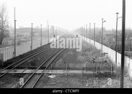 The Berlin Wall and railway line to Hamburg at Staaken during the cold War Stock Photo