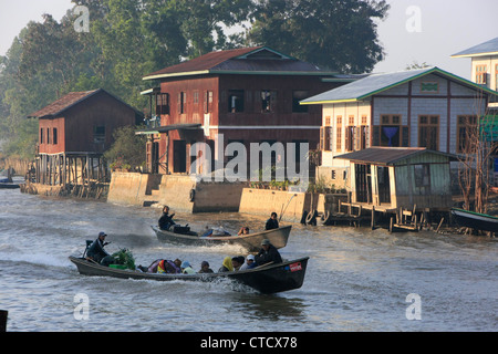 Motorboats carrying people and goods, Inle lake, Shan state, Myanmar, Southeast Asia Stock Photo