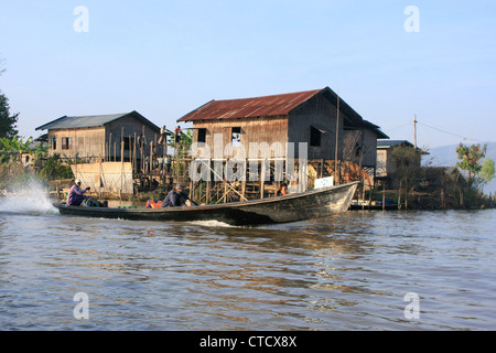 Motorboat carrying people and goods, Inle lake, Shan state, Myanmar, Southeast Asia Stock Photo