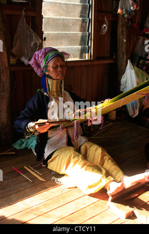 Long-necked woman from Padaung tribe weaving, Inle lake, Shan state, Myanmar, Southeast Asia