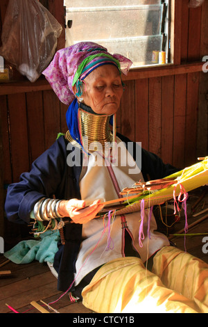Long-necked woman from Padaung tribe weaving, Inle lake, Shan state, Myanmar, Southeast Asia