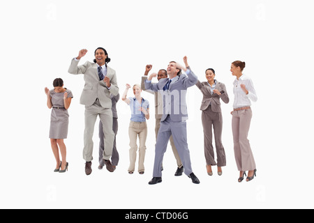 Very happy business people jumping Stock Photo