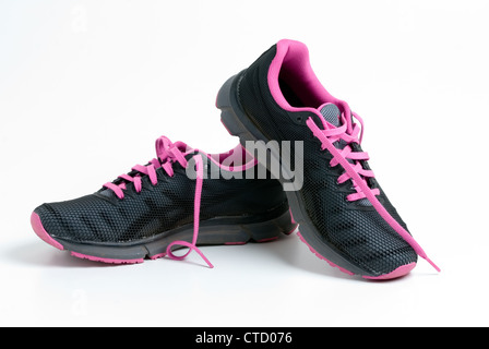 Worn Pair of Pink and black Asics running shoes Stock Photo