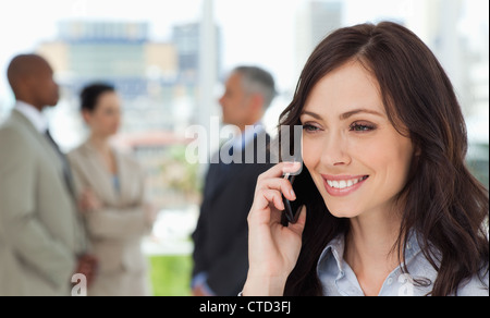 Executive woman talking on the cell phone Stock Photo