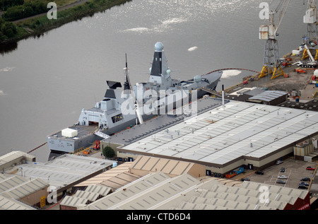 BAE Systems, Glasgow on the River Clyde, with warship in dock. Stock Photo