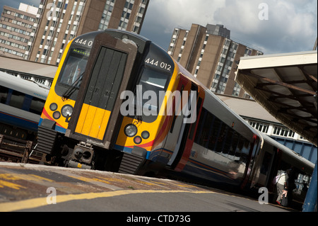 Class 444 passenger train in South West Trains livery at Clapham Junction station, England. Stock Photo