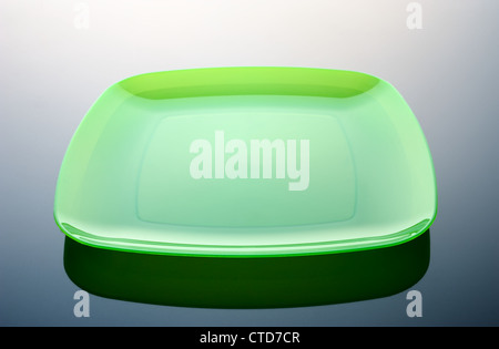 Rectangular plate on a dark reflective surface Stock Photo