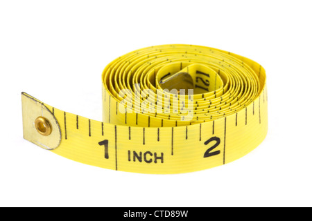 A Close Up Of A Yellow Metric Tape Measure With A White Hand
